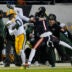 Jan 10, 2026; Chicago, IL, USA; Green Bay Packers wide receiver Matthew Golden (0) makes the reception as Chicago Bears cornerback Jaylon Johnson (1) defends during the first half of an NFC Wild Card Round game at Soldier Field.