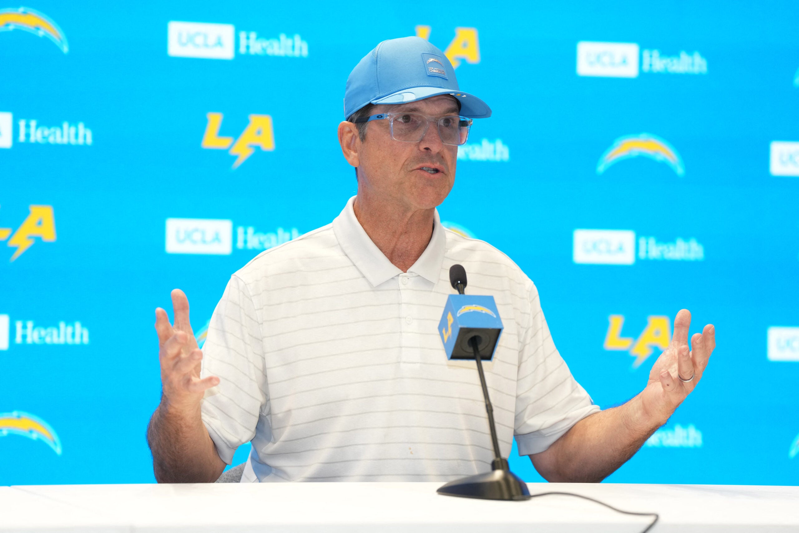 Jan 15, 2026; El Segundo, CA, USA; Los Angeles Chargers coach Jim Harbaugh at press conference at The Bolt.