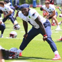Jun 2, 2026; Foxborough, MA, USA; New England Patriots wide receiver A.J. Brown (1) warms up during the team's OTA at Gillette Stadium.