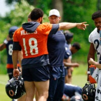 Jun 9, 2026; Lake Forest, IL, USA; Chicago Bears quarterback Caleb Williams (18) talks with head coach Ben Johnson during Minicamp at Halas Hall.