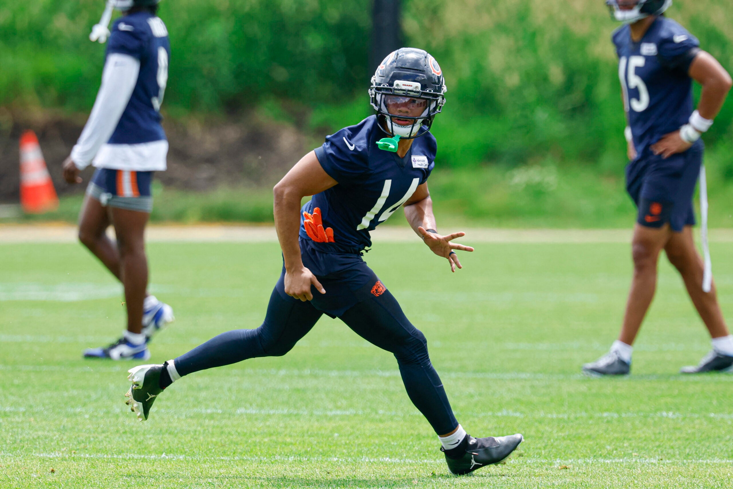 Jun 9, 2026; Lake Forest, IL, USA; Chicago Bears wide receiver Kalif Raymond (14) runs during Chicago Bears Minicamp at Halas Hall.