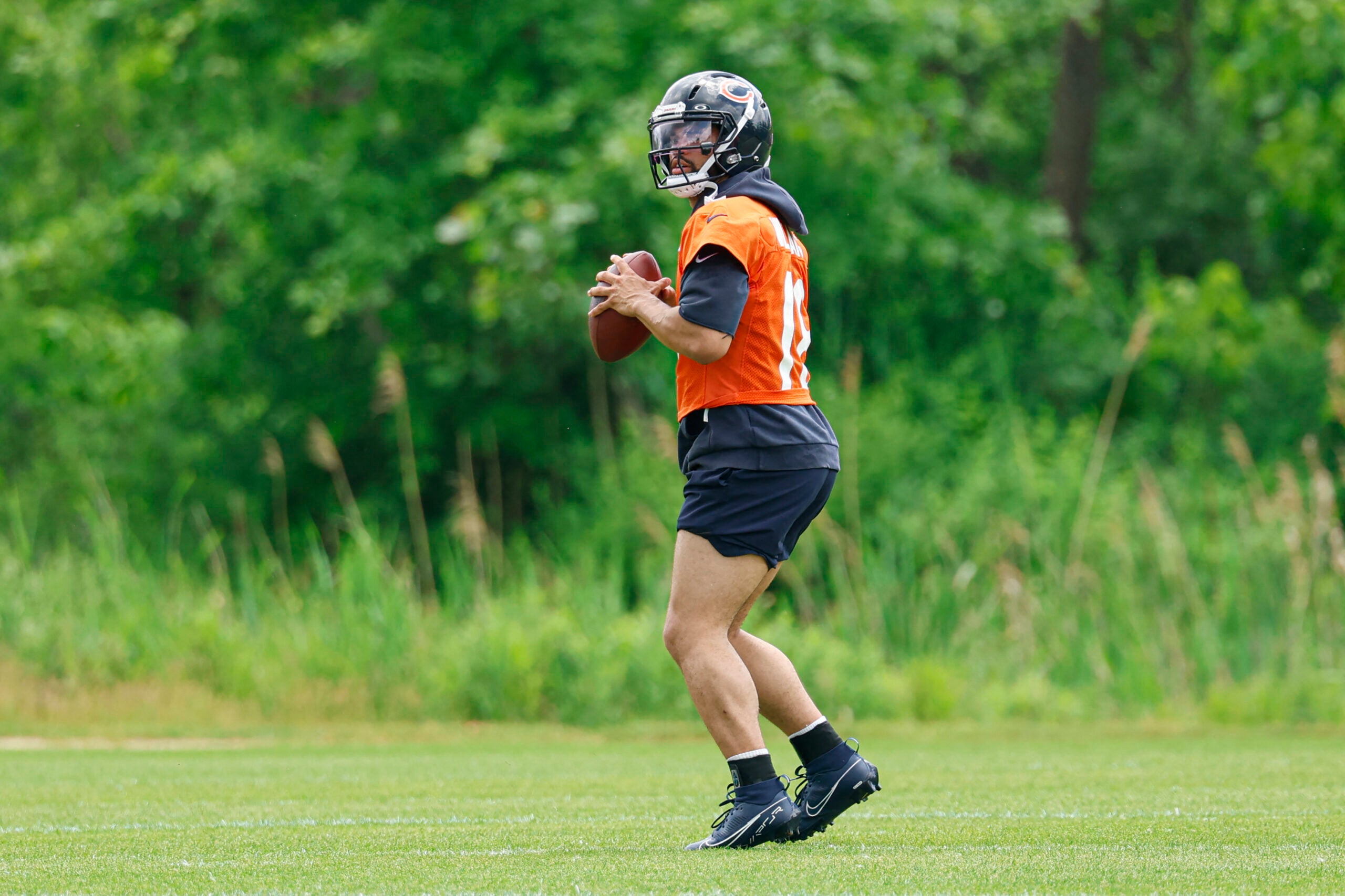 Jun 9, 2026; Lake Forest, IL, USA; Chicago Bears quarterback Caleb Williams (18) looks to pass the ball during Chicago Bears Minicamp at Halas Hall.