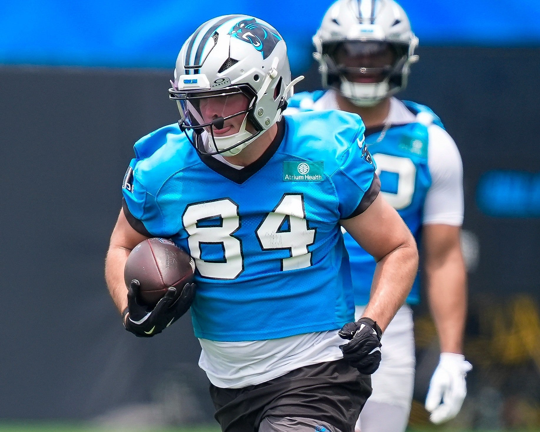 Jun 9, 2026; Charlotte, NC, USA; Carolina Panthers tight end Mitchell Evans (84) makes a catch during the first day of mini camp at Bank of America Stadium practice facility.