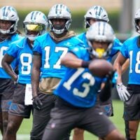 Jun 9, 2026; Charlotte, NC, USA; Wide receivers Xavier Legette, Jalen Coker, David Moore and Ja'seem Reed watch wide receiver John Metchie III (13) make a catch during the first day of mini camp at Bank of America Stadium practice facility.