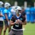 Jun 9, 2026; Charlotte, NC, USA; Carolina Panthers quarterback Bryce Young (9) looks downfield during the first day of mini camp at Bank of America Stadium practice facility.