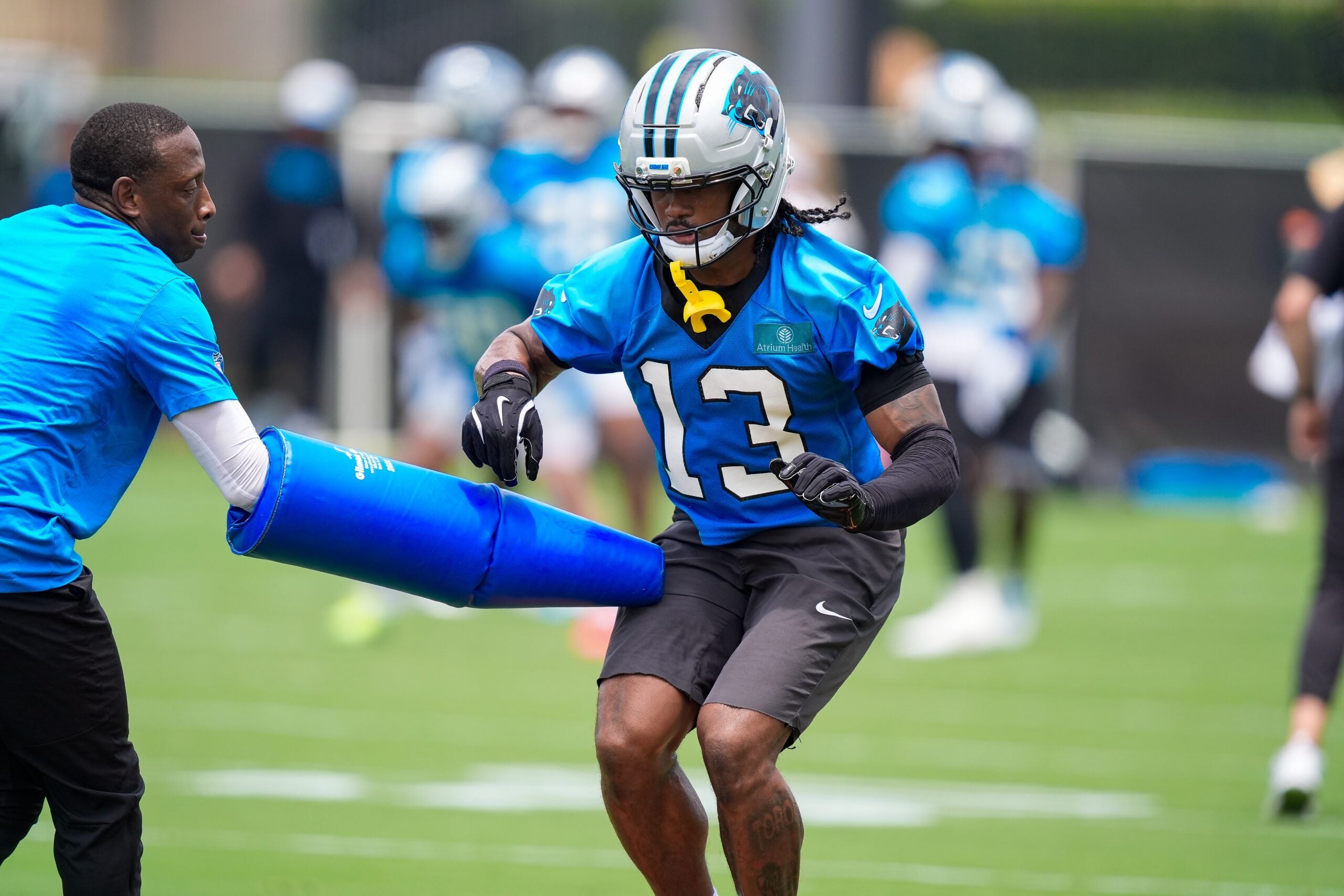 Jun 9, 2026; Charlotte, NC, USA; Carolina Panthers wide receiver John Metchie III (13) practices and avoidance drill during the first day of mini camp at Bank of America Stadium practice facility.