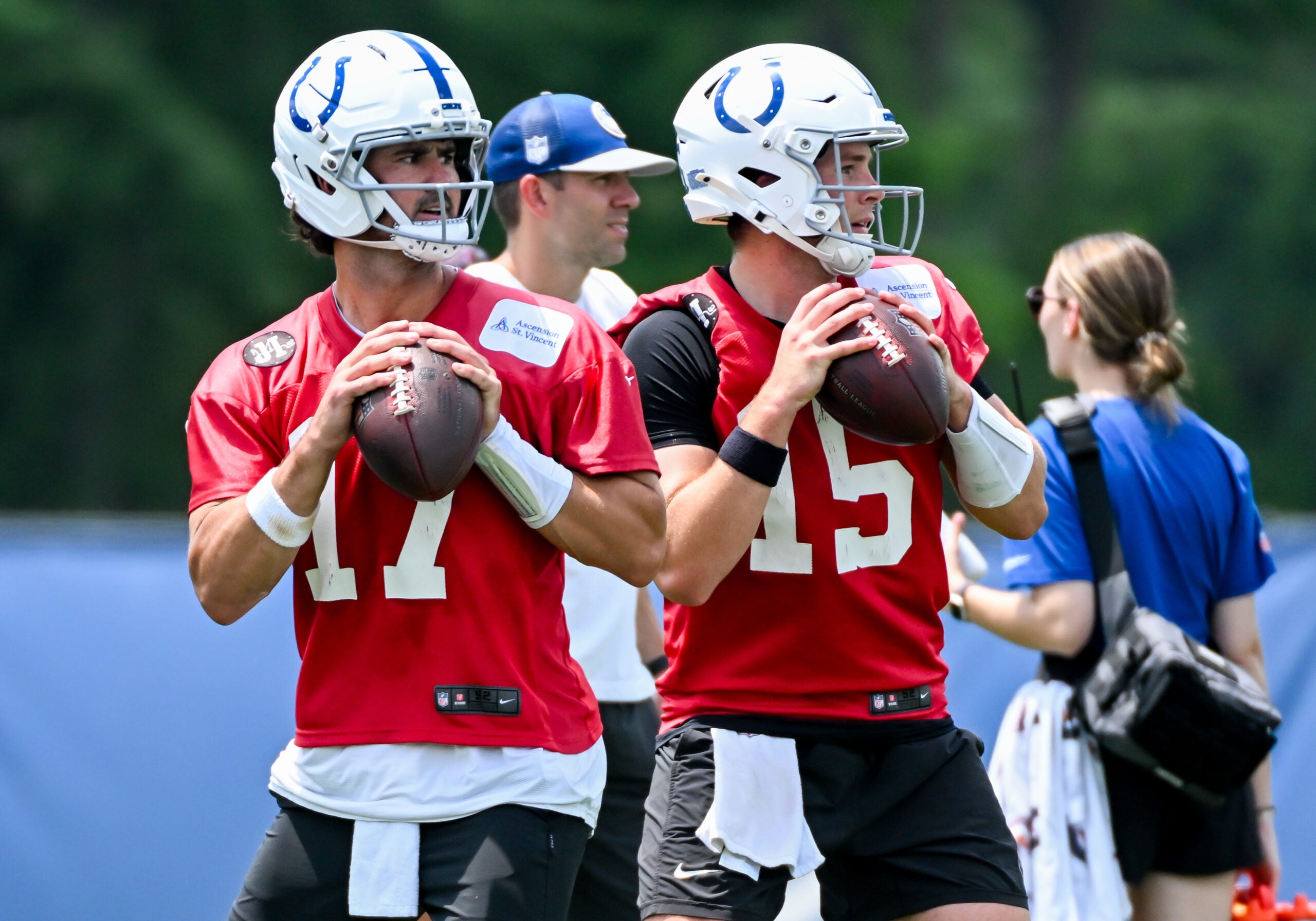 Jun 10, 2026; Indianapolis, IN, USA; Indianapolis Colts quarterback Daniel Jones (17) and Indianapolis Colts quarterback Riley Leonard (15) participate in a drill during minicamp at Indiana Farm Bureau Football Center.
