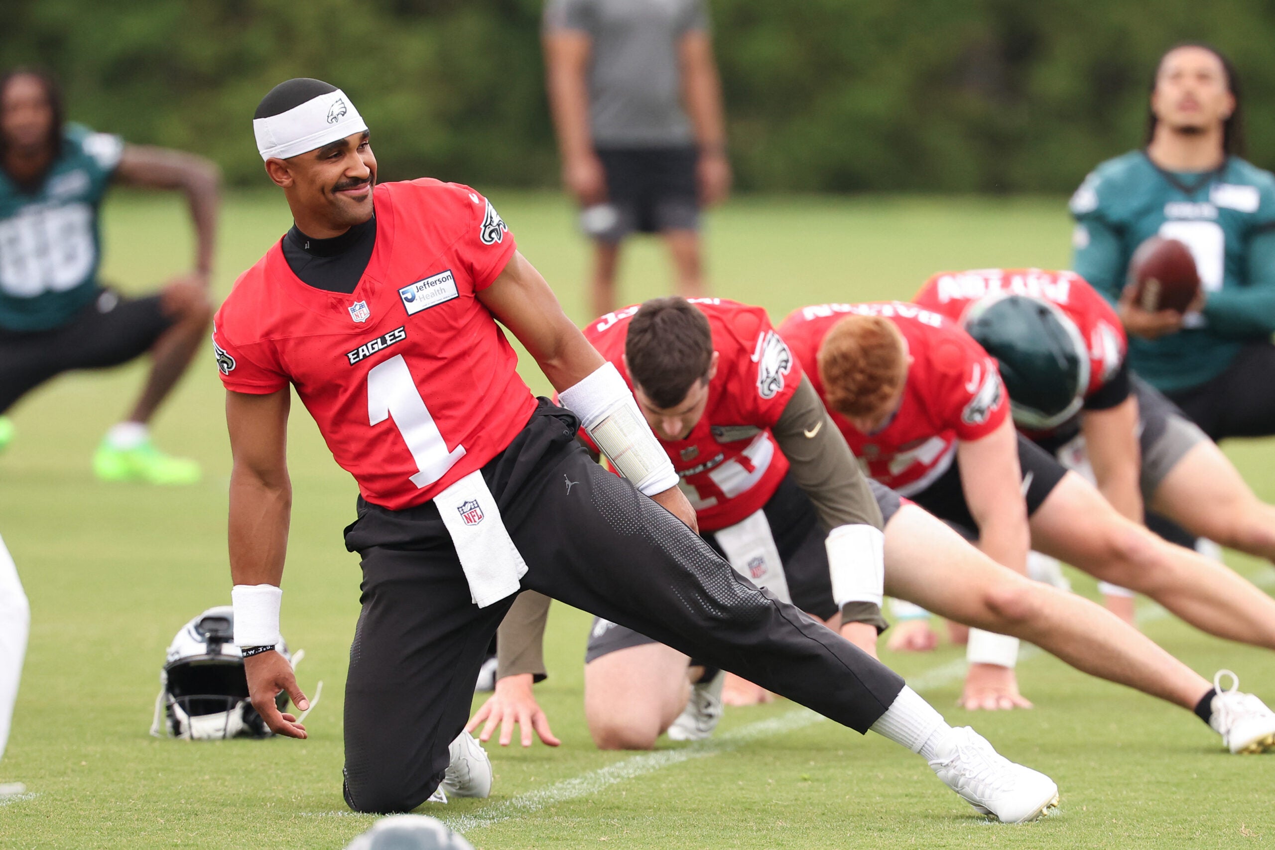 Jun 10, 2026; Philadelphia, PA, USA; Philadelphia Eagles quarterback Jalen Hurts (1) stretches during minicamp at Jefferson Health Training Complex.