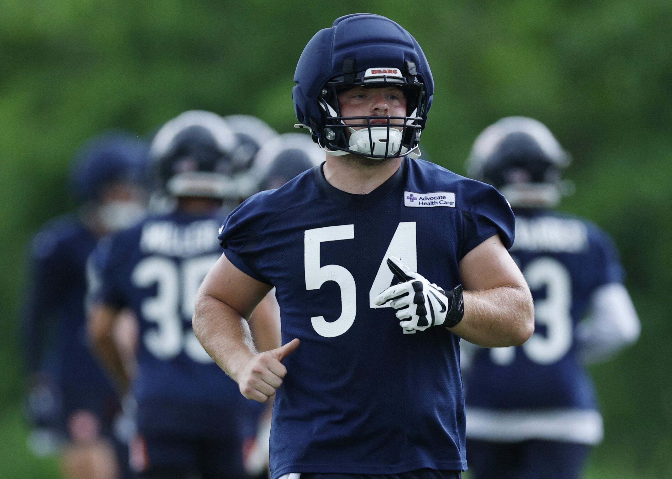 Jun 11, 2026; Lake Forest, IL, USA; Chicago Bears offensive lineman Logan Jones (54) runs on the field during Minicamp at Halas Hall.