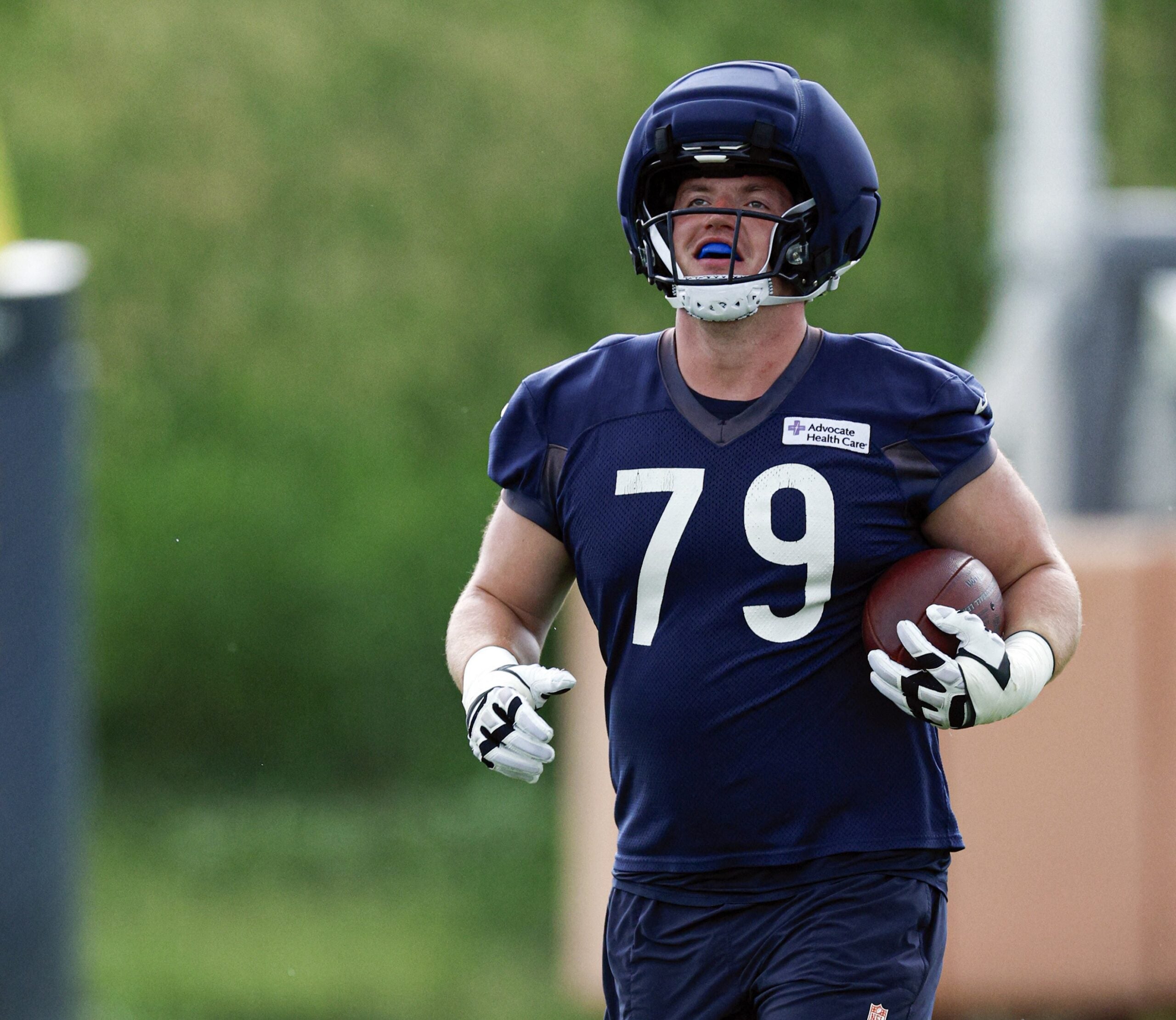 Jun 11, 2026; Lake Forest, IL, USA; Chicago Bears offensive lineman Theo Benedet (79) runs on the field during Minicamp at Halas Hall.