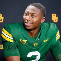 Jul 7, 2026; Frisco, TX, USA; Baylor quarterback DJ Lagway takes questions from reporters during Big 12 Conference Football Media Days at The Star.