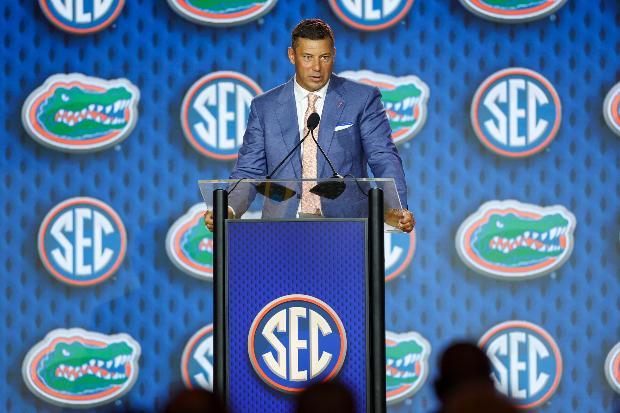Jul 22, 2026; Tampa, FL, USA; Florida Gators head coach Jon Sumrall speaks to the press during SEC Football Kickoff Media Day at the Tampa Marriott.