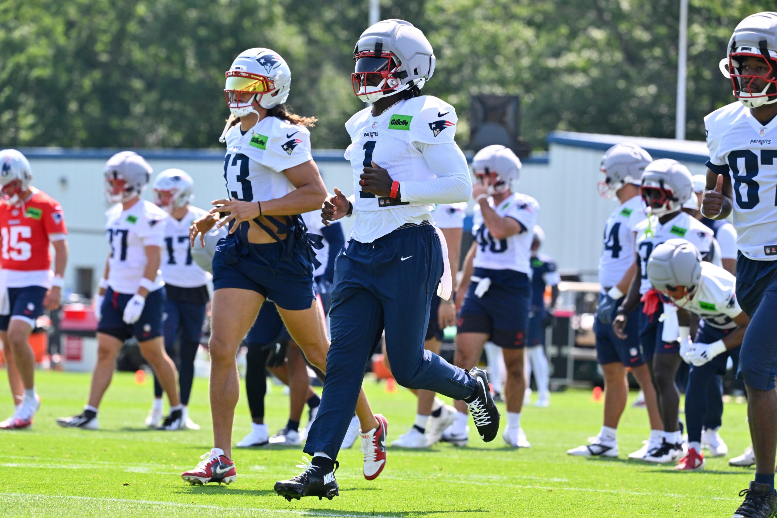 Jul 25, 2026; Foxborough, MA, USA; New England Patriots wide receiver A.J. Brown (1) works out at training camp at Gillette Stadium.