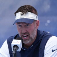 Jul 28, 2026; Oxnard, CA, USA; Dallas Cowboys coach Brian Schottenheimer at training camp opening press conference at River Ridge Playing Fields.