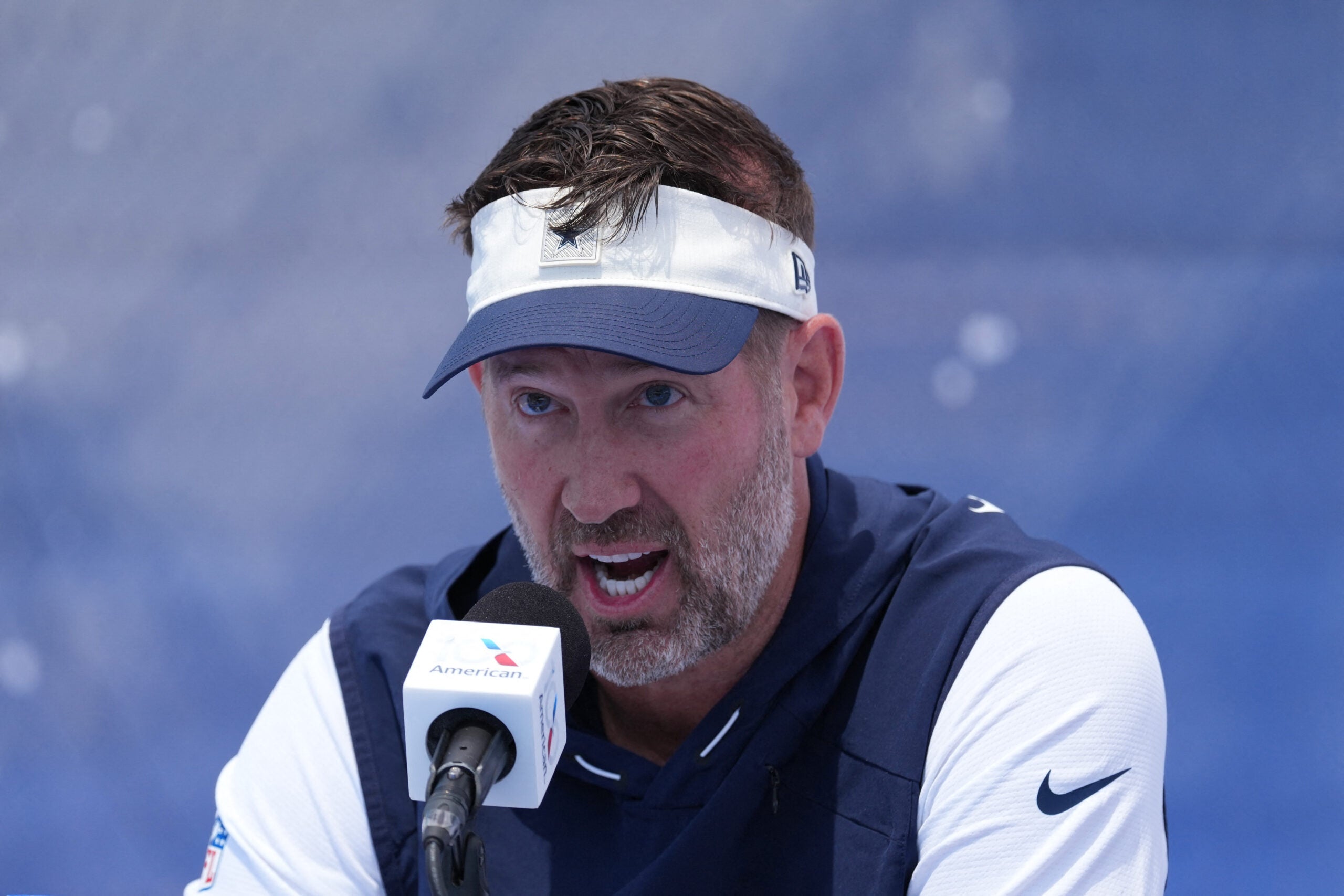 Jul 28, 2026; Oxnard, CA, USA; Dallas Cowboys coach Brian Schottenheimer at training camp opening press conference at River Ridge Playing Fields.