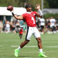 Jul 29, 2026; Philadelphia, PA, USA; Philadelphia Eagles quarterback Jalen Hurts (1) passes the ball during training camp at Jefferson Health Training Complex.