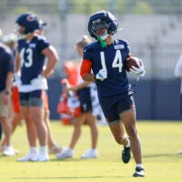 Jul 29, 2026; Lake Forest, IL, USA; Chicago Bears wide receiver Kalif Raymond (14) runs on the field during Training Camp at Halas Hall.
