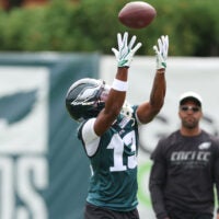 Jul 30, 2026; Philadelphia, PA, USA; Philadelphia Eagles wide receiver Dontayvion Wicks (13) reaches for a pass during training camp at Jefferson Health Training Complex.