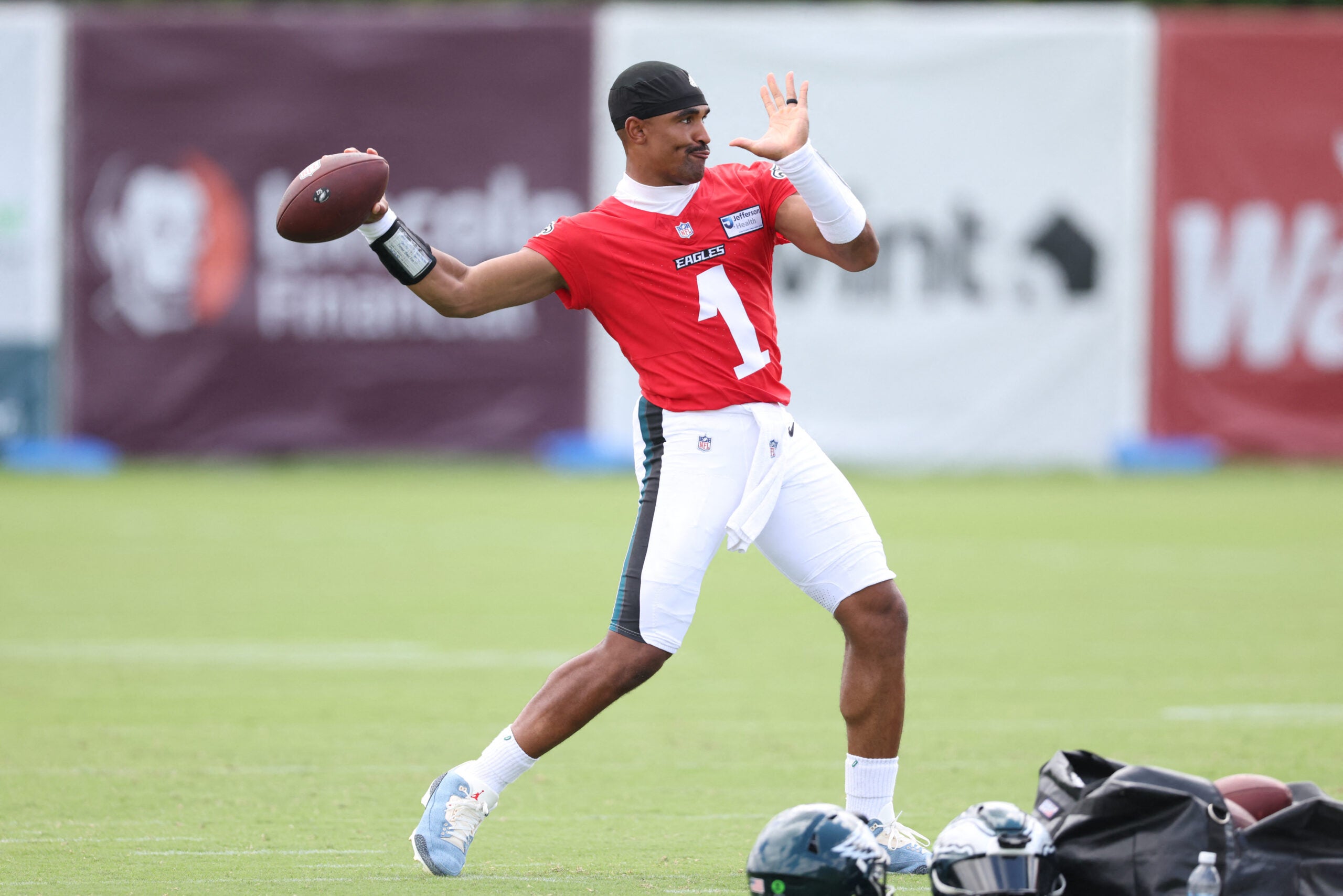 Jul 30, 2026; Philadelphia, PA, USA; Philadelphia Eagles quarterback Jalen Hurts (1) throws a ball during training camp at Jefferson Health Training Complex.