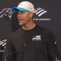 Carolina Panthers head coach Dave Canales speaks with reporters following the first day of training camp.