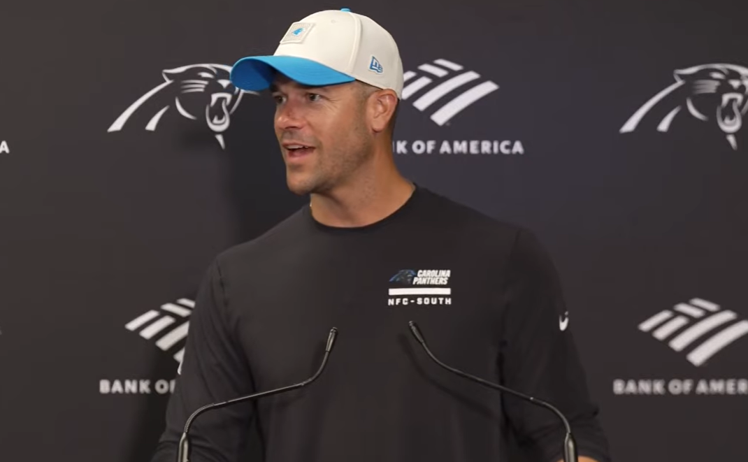 Carolina Panthers head coach Dave Canales speaks with reporters following the first day of training camp.
