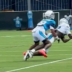 Carolina Panthers wide receiver Xavier Legette makes a catch on the sideline during training camp.