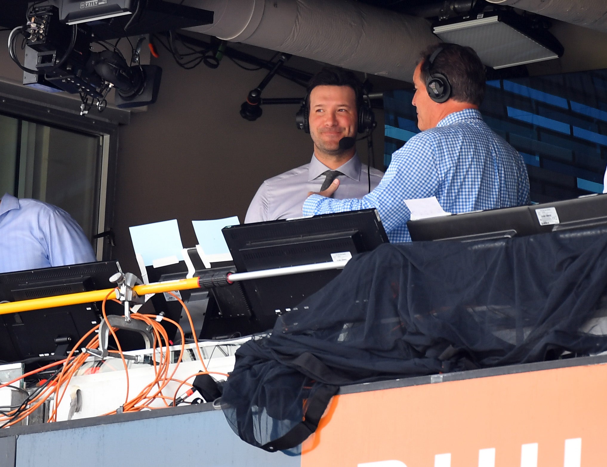 Sep 10, 2017; Nashville, TN, USA; NFL former quarterback Tony Romo in the booth during the Tennessee Titans game against the Oakland Raiders at Nissan Stadium.