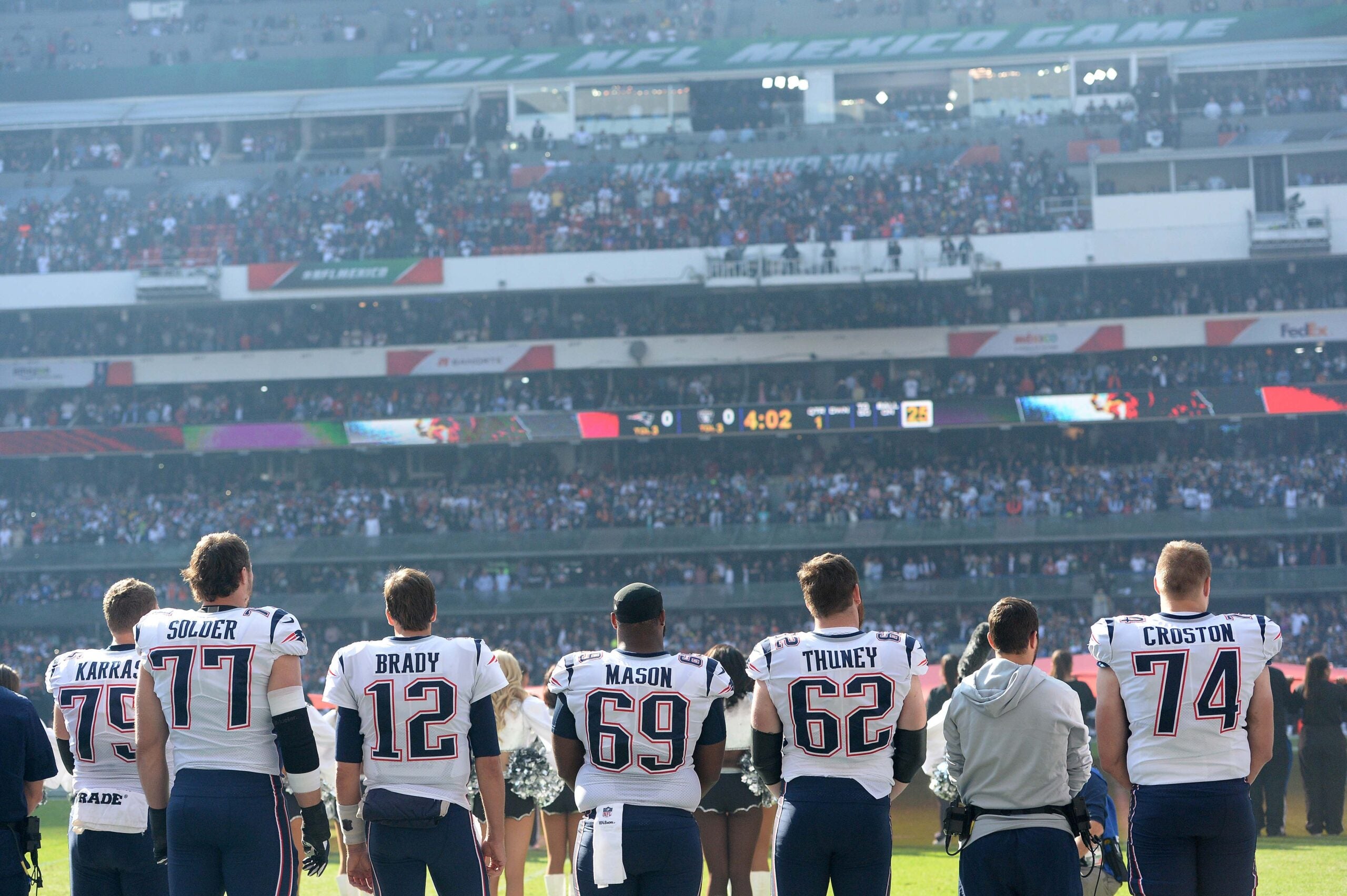 Nov 19, 2017; Mexico City, MEX; New England Patriots players look on from the sideline before the game against the Oakland Raiders at Estadio Azteca. New England won 33-8.