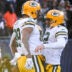 Dec 4, 2022; Chicago, Illinois, USA; Green Bay Packers tight end Marcedes Lewis (89) celebrates with quarterback Aaron Rodgers (12) after Lewis scored a touchdown against the Chicago Bears during the second half at Soldier Field.