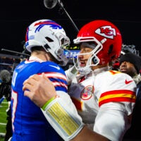 Jan 21, 2024; Orchard Park, New York, USA; Kansas City Chiefs quarterback Patrick Mahomes (15) greets Buffalo Bills quarterback Josh Allen (17) following the 2024 AFC divisional round game at Highmark Stadium.