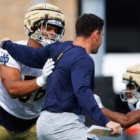 Notre Dame offensive lineman Charles Jagusah (56) participates in a drill during a Notre Dame football practice at Irish Athletic Center on Thursday, Aug. 1, 2024, in South Bend.