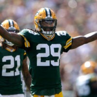 Sep 15, 2024; Green Bay, Wisconsin, USA; Green Bay Packers safety Xavier McKinney (29) celebrates a first half interception against Indianapolis Colts at Lambeau Field.