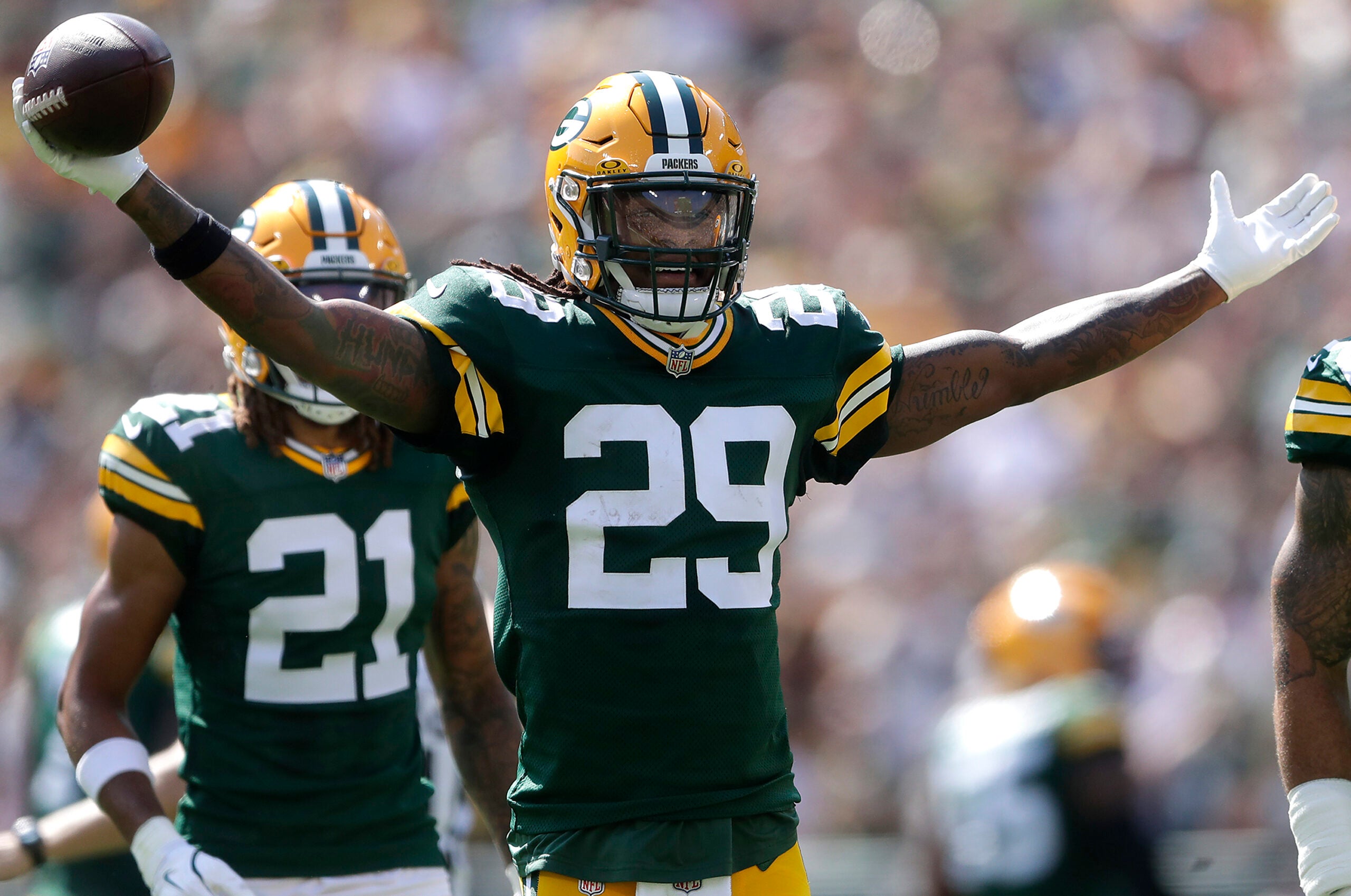 Sep 15, 2024; Green Bay, Wisconsin, USA; Green Bay Packers safety Xavier McKinney (29) celebrates a first half interception against Indianapolis Colts at Lambeau Field.