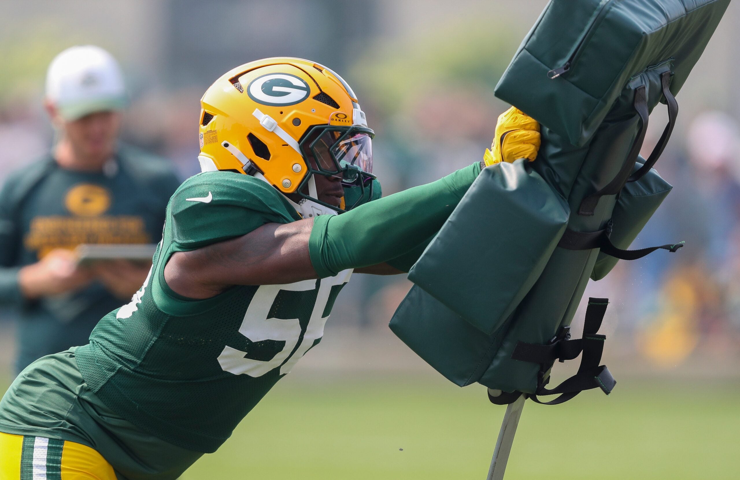 Green Bay Packers linebacker Edgerrin Cooper (56) runs through a drill during practice on Thursday, July 31, 2025, at Ray Nitschke Field in Ashwaubenon, Wis.
