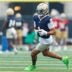 Notre Dame wide receiver Jaden Greathouse runs with the ball during a football practice at Irish Athletic Center on Thursday, July 31, 2025, in South Bend.