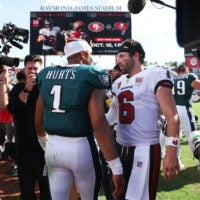 Sep 28, 2025; Tampa, Florida, USA; Philadelphia Eagles quarterback Jalen Hurts (1) and Tampa Bay Buccaneers quarterback Baker Mayfield (6) shake hands after the game at Raymond James Stadium.