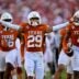 Oct 11, 2025; Dallas, Texas, USA; Texas Longhorns defensive back Graceson Littleton (29) celebrates after he intercepts a pass from Oklahoma Sooners quarterback John Mateer (not pictured) during the second half at the Cotton Bowl.