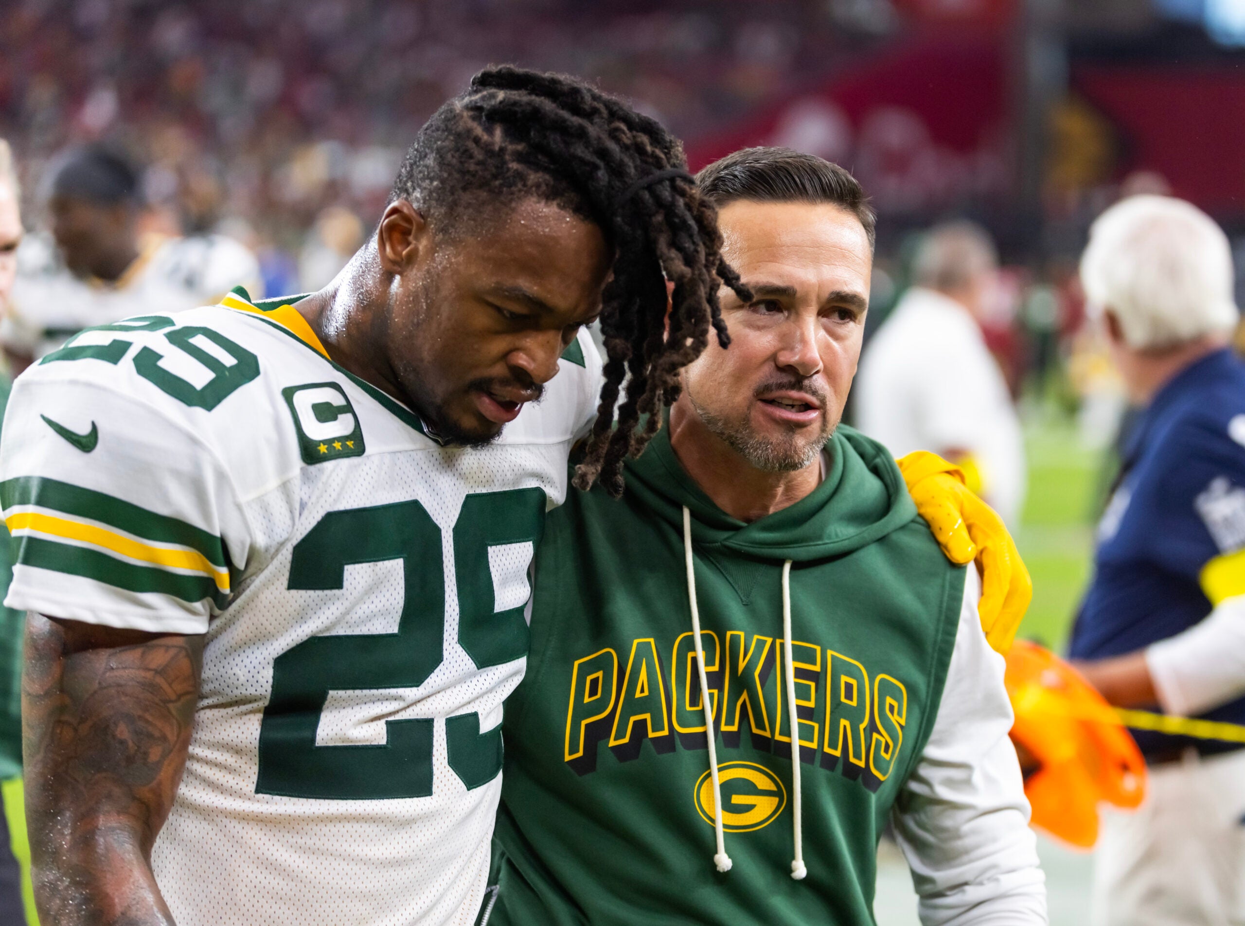 Oct 19, 2025; Glendale, Arizona, USA; Green Bay Packers head coach Matt LaFleur celebrates with safety Xavier McKinney (29) after defeating the Arizona Cardinals at State Farm Stadium.