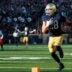 Notre Dame safety Luke Talich (28) runs a blocked punt into the end zone for a touchdown in the first half of a NCAA football game against Syracuse at Notre Dame Stadium on Saturday, Nov. 22, 2025, in South Bend.
