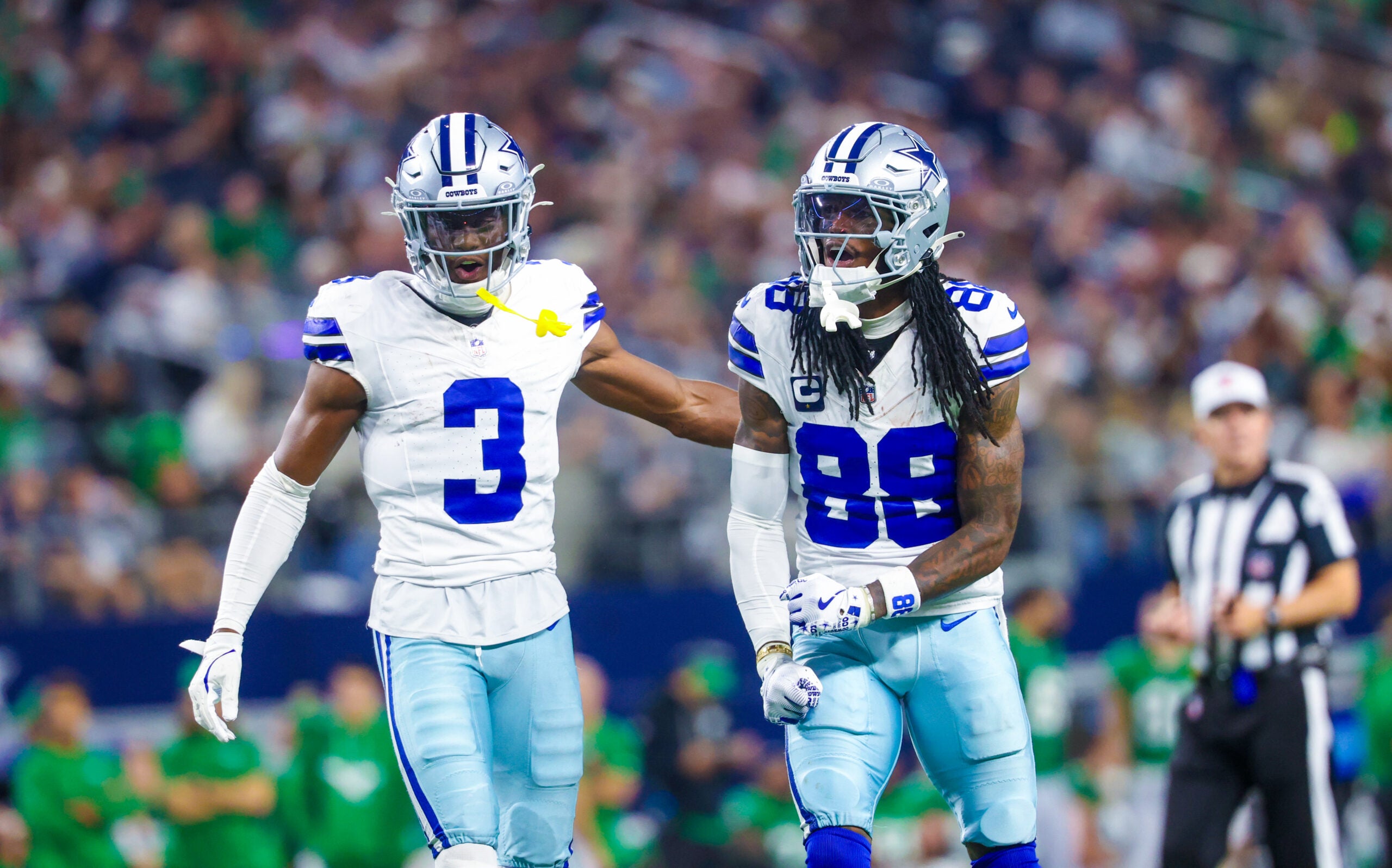 Nov 23, 2025; Arlington, Texas, USA; Dallas Cowboys wide receiver George Pickens (3) and Dallas Cowboys wide receiver CeeDee Lamb (88) react during the game against the Philadelphia Eagles at AT&T Stadium.