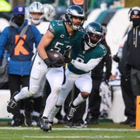 Dec 14, 2025; Philadelphia, Pennsylvania, USA; Philadelphia Eagles linebacker Zack Baun (53) celebrates with cornerback Adoree' Jackson (8) after an interception during the third quarter at Lincoln Financial Field.