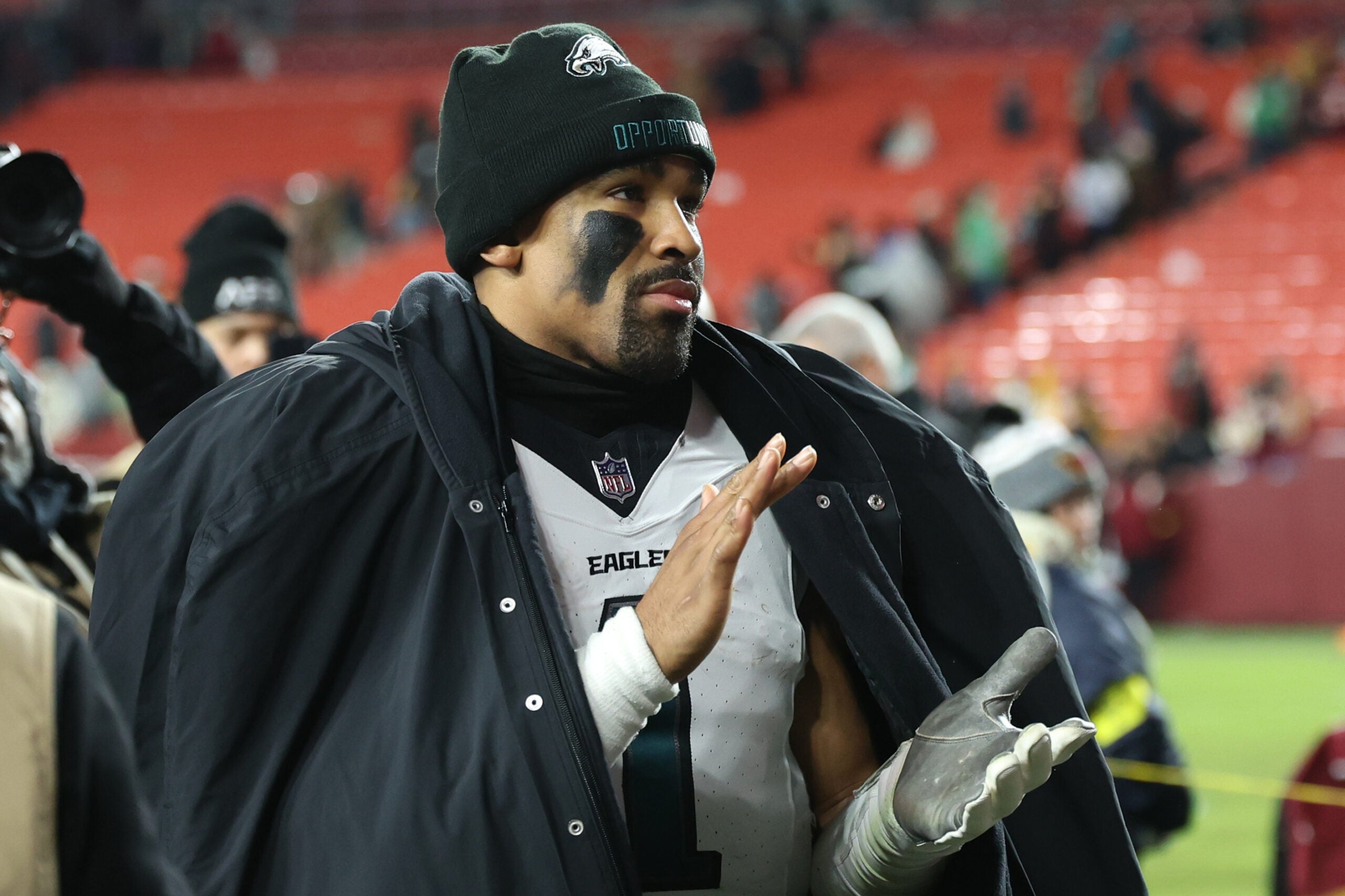 Dec 20, 2025; Landover, Maryland, USA; Philadelphia Eagles quarterback Jalen Hurts (1) leaves the field after defeating the Washington Commanders at Northwest Stadium.