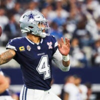 Dec 21, 2025; Arlington, Texas, USA; Dallas Cowboys quarterback Dak Prescott (4) passes against the Los Angeles Chargers during the first quarter at AT&T Stadium.