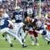 Dec 25, 2025; Landover, Maryland, USA; Dallas Cowboys linebacker Marist Liufau (35) and safety Malik Hooker (28) tackle Washington Commanders running back Jacory Croskey-Merritt (22) in the third quarter at Northwest Stadium.
