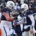 Dec 27, 2025; Bronx, NY, USA; Penn State Nittany Lions quarterback Ethan Grunkemeyer (17) celebrates with offensive lineman Cooper Cousins (50) after a touchdown pass during the second half of the 2025 Pinstripe Bowl against the Clemson Tigers at Yankee Stadium.