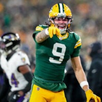 Dec 27, 2025; Green Bay, Wisconsin, USA; Green Bay Packers wide receiver Christian Watson (9) celebrates after catching a pass during the third quarter against the Baltimore Ravens at Lambeau Field.