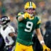 Dec 27, 2025; Green Bay, Wisconsin, USA; Green Bay Packers wide receiver Christian Watson (9) celebrates after catching a pass during the third quarter against the Baltimore Ravens at Lambeau Field.