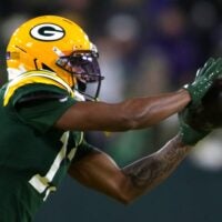 Green Bay Packers wide receiver Dontayvion Wicks (13) catches a pass against the Baltimore Ravens on Saturday, December 27, 2025, at Lambeau Field in Green Bay, Wis. The Ravens defeated the Packers 41-24.