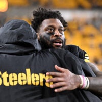 Jan 12, 2026; Pittsburgh, PA, USA; Pittsburgh Steelers linebacker Patrick Queen (6) hugs a teammate following an AFC Wild Card Round loss to the Houston Texans at Acrisure Stadium.