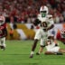Jan 19, 2026; Miami Gardens, FL, USA; Miami Hurricanes wide receiver Malachi Toney (10) rushes the ball for a touchdown against the Indiana Hoosiers in the second half during the College Football Playoff National Championship game at Hard Rock Stadium.